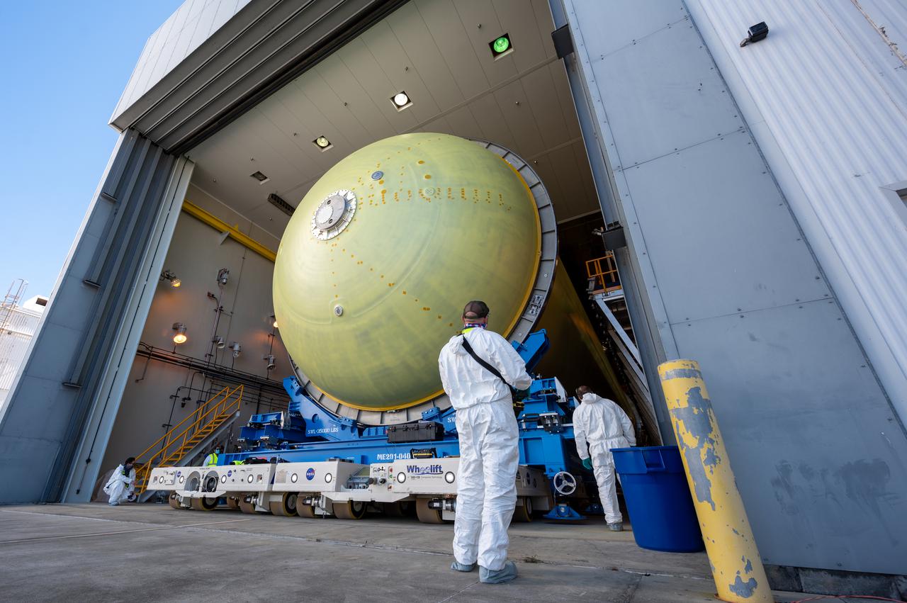 This image highlights the liquid hydrogen tank that will be used on the core stage of NASA’s Space Launch System rocket for Artemis II, the first crewed mission of NASA’s Artemis program. The tank is being built at NASA’s Michoud Assembly Facility in New Orleans. The SLS core stage is made up of five unique elements: the forward skirt, liquid oxygen tank, intertank, liquid hydrogen tank, and the engine section. The liquid hydrogen tank holds 537,000 gallons of liquid hydrogen cooled to minus 423 degrees Fahrenheit and sits between the core stage’s intertank and engine section. The liquid hydrogen hardware, along with the liquid oxygen tank, will provide propellant to the four RS-25 engines at the bottom of the cores stage to produce more than two million pounds of thrust to launch NASA’s Artemis missions to the Moon. Together with its four RS-25 engines, the rocket’s massive 212-foot-tall core stage — the largest stage NASA has ever built — and its twin solid rocket boosters will produce 8.8 million pounds of thrust to send NASA’s Orion spacecraft, astronauts and supplies beyond Earth’s orbit to the Moon and, ultimately, Mars. Offering more payload mass, volume capability and energy to speed missions through space, the SLS rocket, along with NASA’s Gateway in lunar orbit, the human landing system, and Orion spacecraft, is part of NASA’s backbone for deep space exploration and the Artemis lunar program. No other rocket can send astronauts in Orion around the Moon in a single mission.
